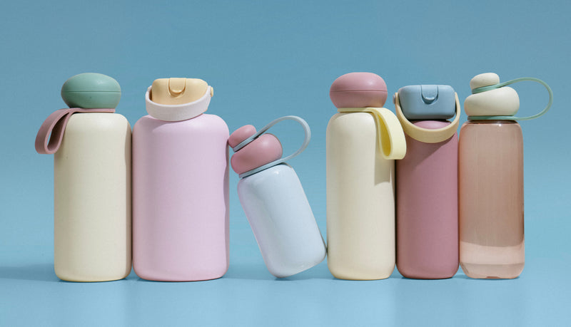 Discover the Sunnies Studios Summer Collection — colorful insulated water bottles with straps, caps, and accessories designed for outdoor days and everyday hydration.